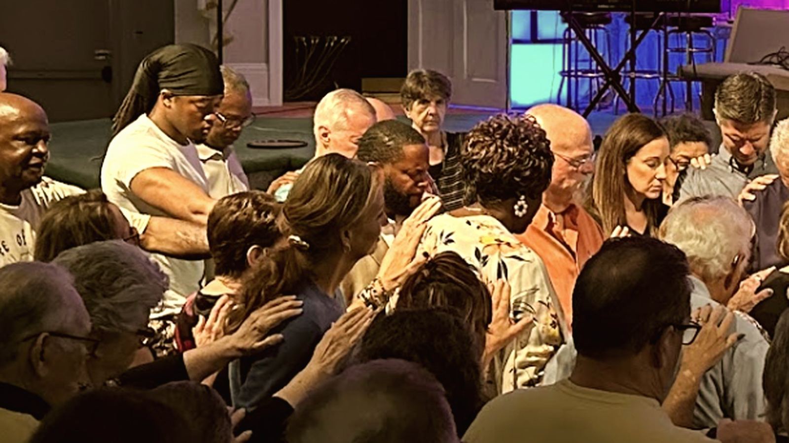 The church gathered in prayer
