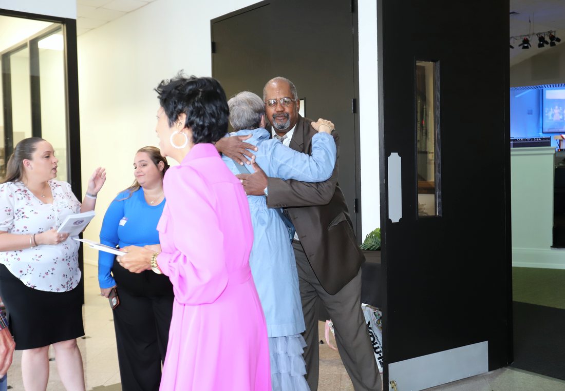 A warm welcome at the sanctuary doors