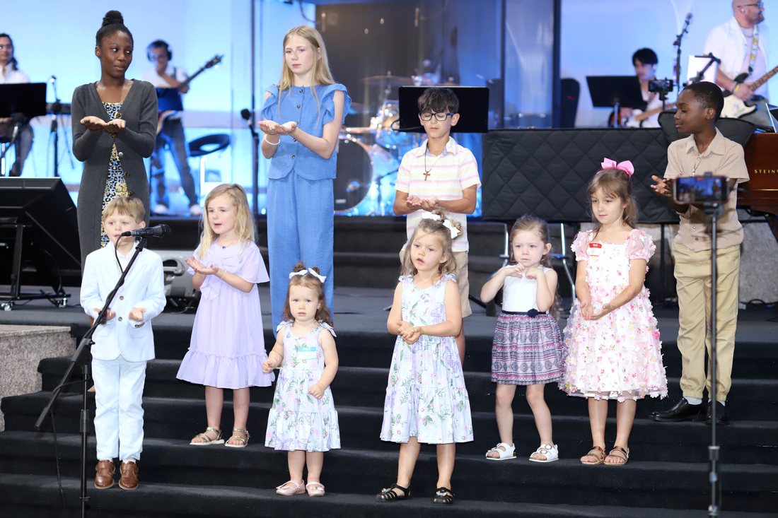 Children worshiping together