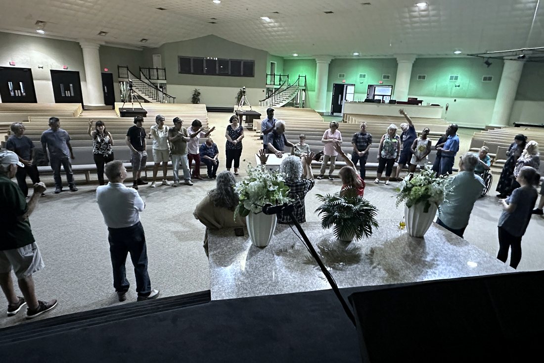 Praying together at the altar