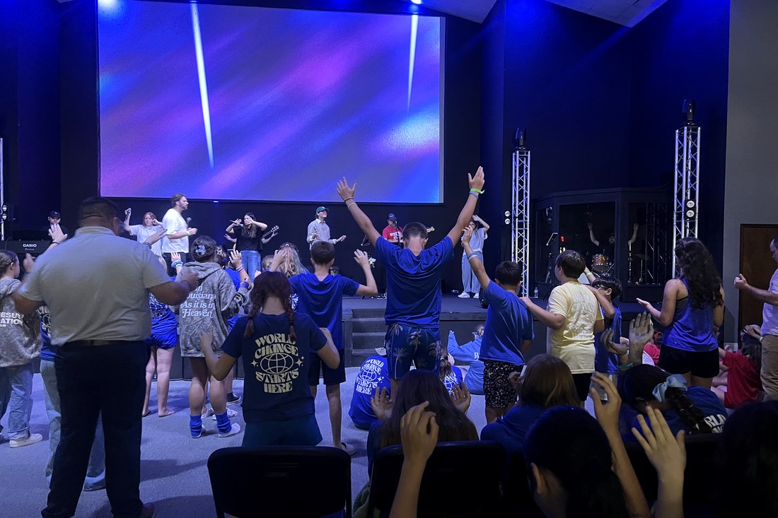 Youth worshiping together